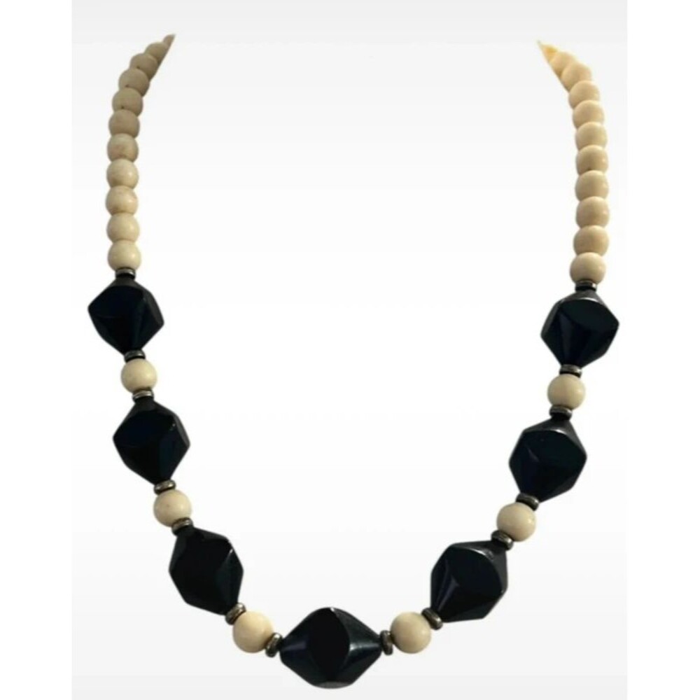Vintage beaded necklace graduated sizes 22” long  Cream and black